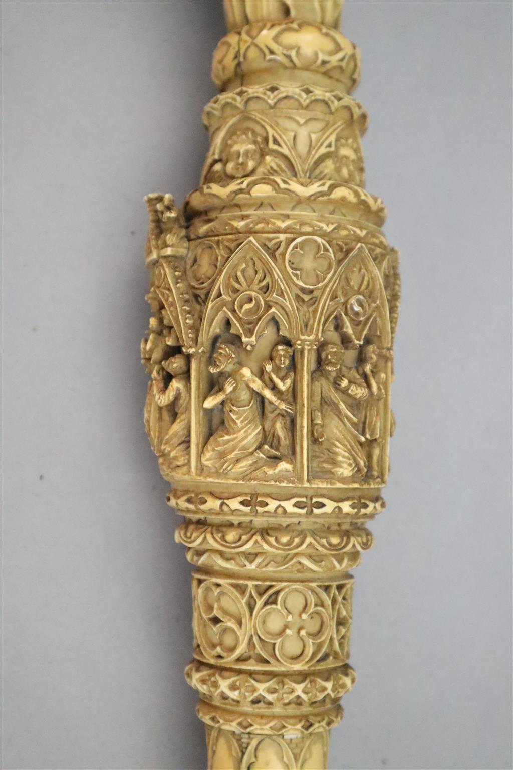 A 19th century Dieppe carved ivory crozier, thought to be a copy of a 13th century example, length 46in.